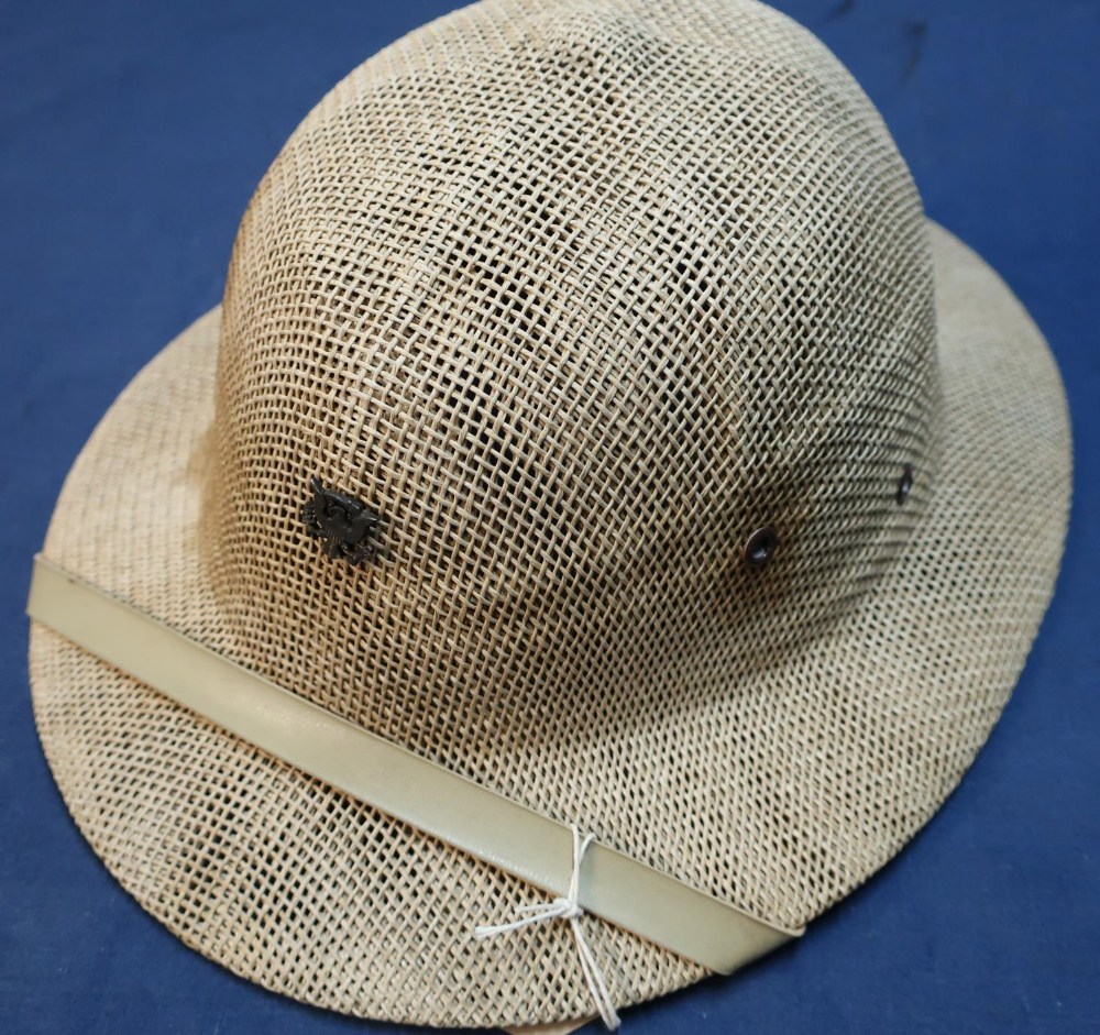 American military wartime sun hat with lapel pin badge, complete with chin strap and liner