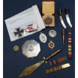 Small selection of various military items including Royal Army Medical Corp white metal compact,