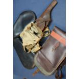 Two padded pistol travelling cases, gun slip, bandoleers and a circa WWI tan leather pistol holster