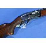 Remington model 1100 12 bore semi auto shotgun with 25 inch barrels, 13 3/4 inch pistol grip
