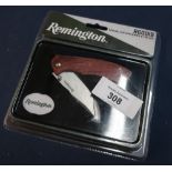 Sealed as new Remington R60019 Special Edition knife and tin set