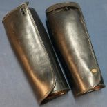 Pair of black leather gaiters, the inside stamped 15 1/2