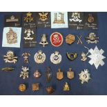 Selection of various assorted military cap badges, mostly British including a good selection of