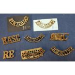 Small selection of military brass shoulder titles including 3 Leicester titles, 1 x AFC, 1 x RE, 1 x