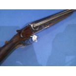 Unknown make 12 bore side by side shotgun with 28 inch barrels and 14 inch stock, serial no.
