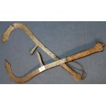 Pair of 19th/20th C Indian throwing axe/knives with twin points, engraved detail and snake skin