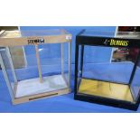 Two display cabinets for optics/knives, one labelled Burris