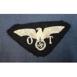 German Nazi embroidered O T eagle above swastika cloth badge