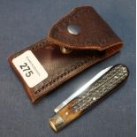 George Wostenholm of Sheffield single bladed pocket knife with two piece lambs foot grips and