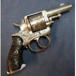 Belgium .320 revolver with nickle plated finish, engraved detail and two piece carved grip, 2 /14