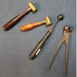 Cast metal bullet mould, two powder measures with turned wood handles and another measure (4)