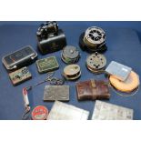 Box of various fly fishing equipment including flies, lines, various tins, a hard Alox Lamson