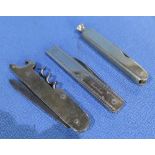 Three Sheffield made pocket knives including a pipe smokers knife, another with corkscrew and