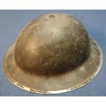 WWI British military steel helmet complete with liner and chin strap stamped MM 1939