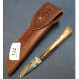 Harry Boden 2 inch bladed skinning knife with two piece burr wood grips and leather belt sheath