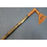 19th/20th C Indian hand axe, the steel head with pierced detail and carved wood shaft (overall