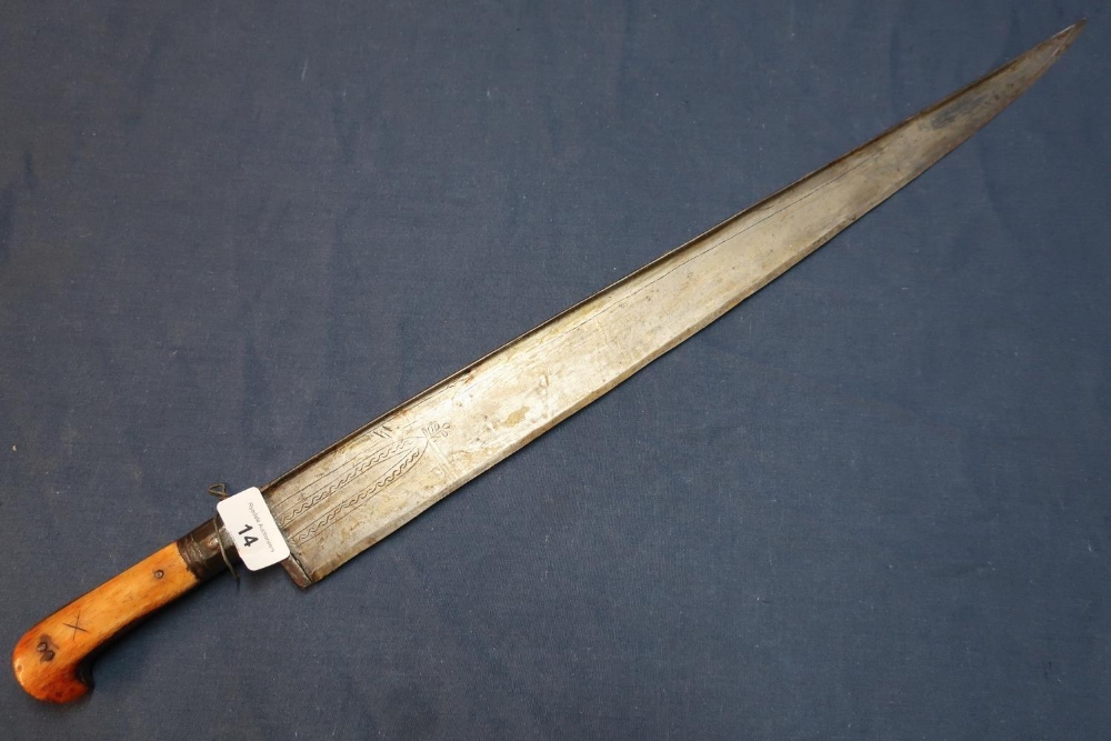 19th C Khyber knife with 23 1/2 inch tapering blade, the first section with engraved detail, with