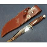 John Nowill & Sons of Sheffield sheath knife with 5 1/2 inch blade and wooden barrel grip,