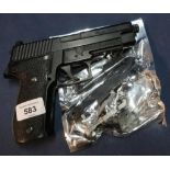 Sig Sauer P226 .177 air pistol and a large selection of various parts and accessories