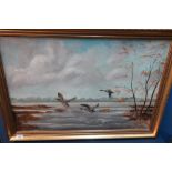 Gilt framed oil on canvas of Mallard ducks in flight, signed lower left Stanley Dollimore 1974 (85cm