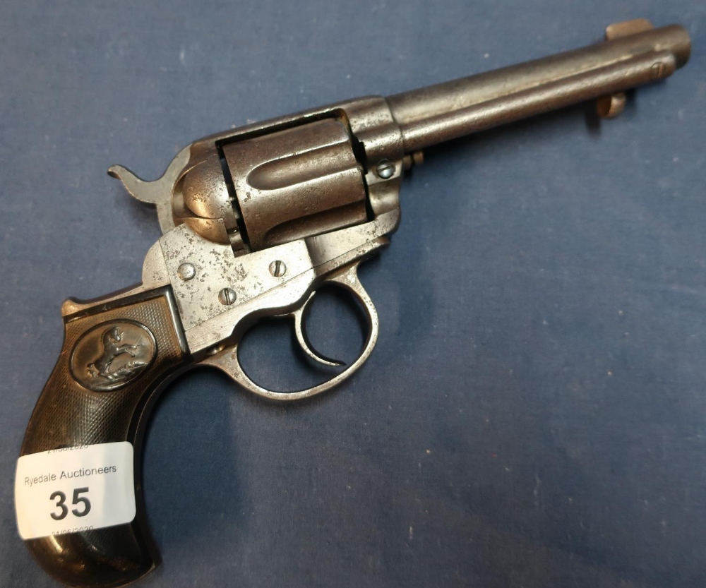 Colt .41 centre fire double action revolver with 4 1/2 inch barrel with engraved details to the