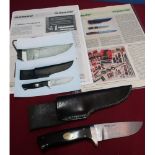 Safari Club 1-100 Carlton Ltd sheath knife with 4 inch Damascus blade with two piece wooden grips =