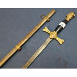 Late 19th C American dress sword with 30 inch double edge blade with engraved detail marked K of A