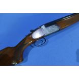 Italian 12 bore over and under single trigger ejector shotgun with 27 3/4 inch barrels, 14 1/4