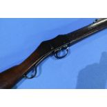 Martini action 20 bore underlever twin banded service rifle complete with cleaning rod side