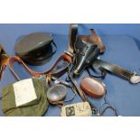 Selection of various military items including belts, stable belts, compass cases, leather holster,