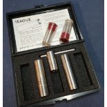 Cased part set of Teague chokes, will key - 1 x 1/2 and 1 x 3/4, and two 12 bore snap caps