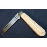 Sheffield made single bladed pocket knife with 2 1.4 inch blade, ivory grips and working back detail