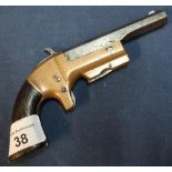 Taylor & Co single shot .30 rimfire Derringer type pistol with 3 1/2 inch octagonal barrel with