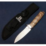 Boxed as new Rough Rider sheath knife 3 1/2 inch blade and two piece burr wood grip, complete with