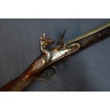 Late 18th C flintlock brass barrelled blunderbuss by Clarke, the 14 3/4 inch brass barrel