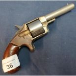 Eureka No.2 .32 rimfire revolver with nickle plated finish, 2 1/2 inch barrel and two piece wooden