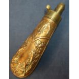 Small brass and copper powder flask with stags head motif and acorn leaf design (length 17cm) (