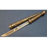 Eastern style Dhal type dagger with 10 1/2 inch single edged blade with engraved detail of various