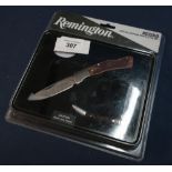 Sealed as new Remington R60018 Special Edition knife and tin set