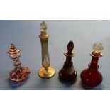 Group of four Victorian and later glass scent bottles (tallest bottle 18cm high)