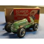 Boxed Schuco Studio 1050 clockwork car, complete with key an original box