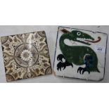 Unusual glazed tile depicting a dragon (A/F) and a William Morris style tile (2)