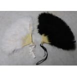 Two vintage black and white ostrich feather fans