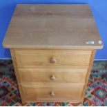 Treske light wood bedside chest of three drawers (49cm x 45cm x 58cm)