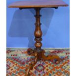 Victorian mahogany rectangular top tilt-top table on turned column of three out-splayed supports