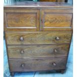 Victorian mahogany chest with two upper panelled cupboard doors above three long drawers, on