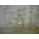 Pair of long necked decanters and a square form decanter (3)