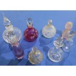 Collection of eight Victorian and later cut and moulded glass scent bottles (tallest 16cm high)