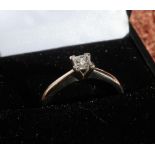 18ct white gold diamond solitaire ring with square cut diamond, approx .25ct (size Q)
