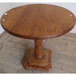 Yorkshire oak 'Acornman' circular top table on turned column and stepped square base (76 cm